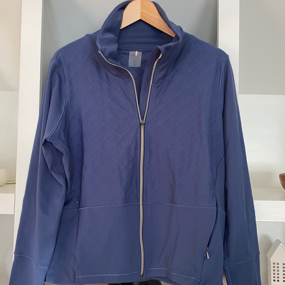 Carrie Underwood full zip blue jacket with pockets